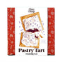 The FarmSteady Pastry Tart Making Kit box shows two lavender-iced tarts—one with a bite taken out—on a white background with red patterned sides and includes all essentials plus the signature pastry mix.