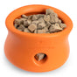 An orange, bowl-shaped dog toy embossed with DOGS BEST FRIEND is filled with small, beige, cube-shaped West Paw Beef Rawbiotic Bites Dog Food Topper treats.