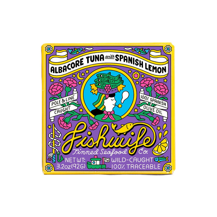 Fishwife Albacore Tuna with Spanish Lemon comes in a colorful tin decorated with flowers and a woman’s profile, featuring bold “Pole & Line Caught,” “Wild-Caught,” and “100% Spanish Olive Oil” text.
