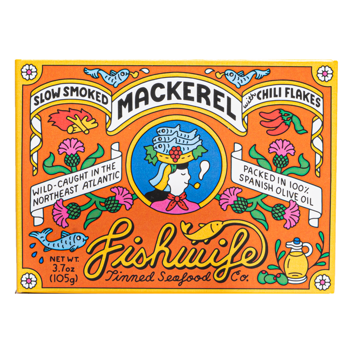 Fishwifes Slow Smoked Mackerel with Chili Flakes features vibrant packaging of a woman with fish, floral, and sea motifs. Its wild-caught, slow smoked, enhanced with chili flakes, and packed in Spanish olive oil.