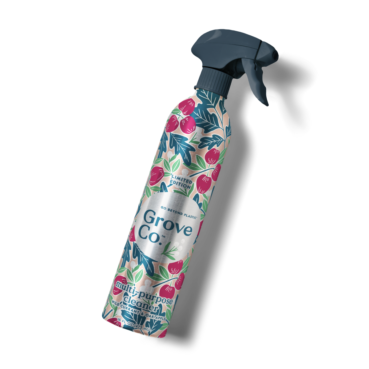 A Grove Co. multi-purpose cleaner spray bottle with a dark spray nozzle. The bottle features a colorful floral and berry design and is labeled as a limited edition with lavender aroma.