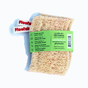 A Floofah Luffa + Wood Dual Kitchen & Dish Sponge with a green paper band listing usage instructions, care tips, and brand contact information.