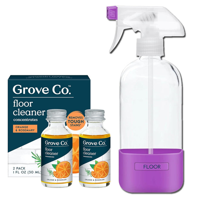 The Grove Co. Floor Cleaner Concentrate Starter Pack Bundle includes a blue box, two small orange & rosemary concentrate bottles, and a reusable glass spray bottle labeled FLOOR with a purple base—ideal for laminate floor cleaning.