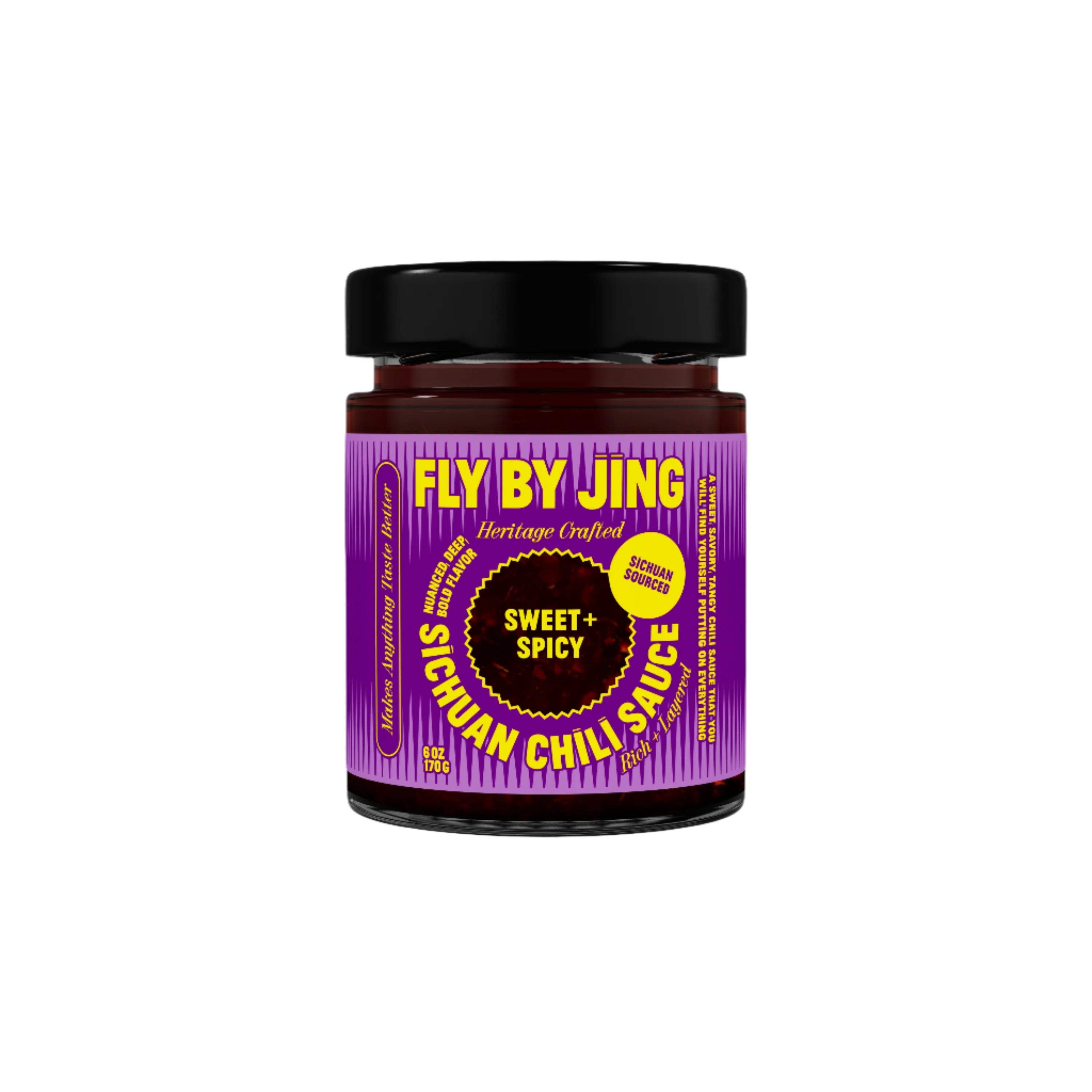 A jar of Fly By Jing Sweet & Spicy Sichuan Chili Sauce, with a purple and yellow label reading Sweet + Spicy and Heritage Crafted, is displayed against a plain white background.
