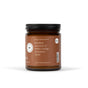 Experience the Jar Candle - Beeswax and Coconut Oil from Fontana Candle Co.—a brown glass jar candle with a sleek black lid. The white label showcases simple, natural ingredients: beeswax, coconut oil, sweet orange, cinnamon, and clove with the reassuring phrase “That’s it! 100% essential oils.” Enjoy this non-toxic scented candle made only from natural ingredients for a clean and inviting aroma—a truly pure choice for your home.