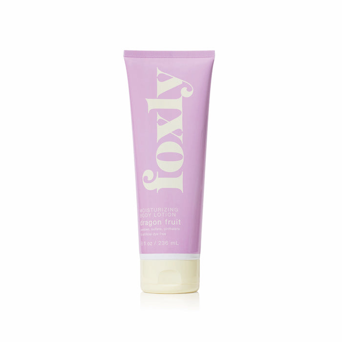 A lavender tube of Foxly Body Lotion in dragon fruit scent stands upright on a white background, featuring a white cap, bold white branding, and enriched with nourishing oils for skin hydration.