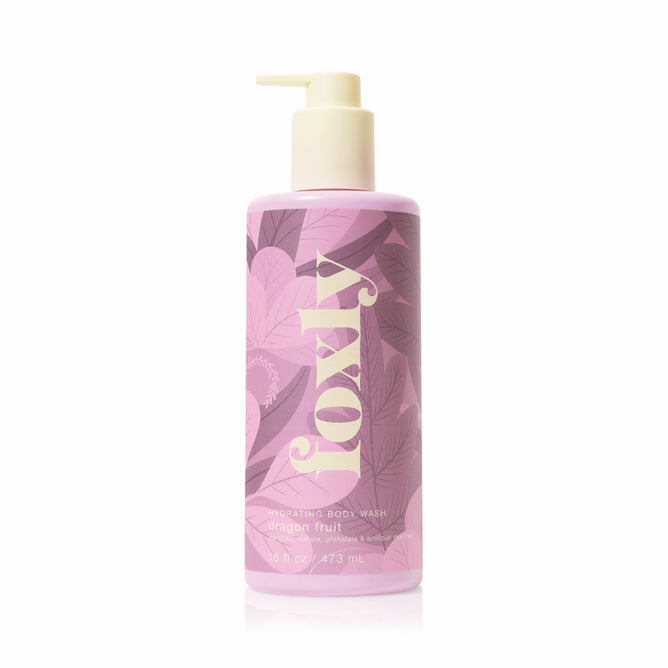 A pink Foxly Body Wash bottle with a pump, clean ingredients, and dragon fruit label features light and dark pink leaf designs on the front.