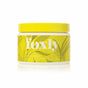 A yellow 12 oz (340 g) Foxly Body Scrub in Citrus Beach scent, featuring exfoliating sugar crystals and nourishing oils, in a botanical design with white text.