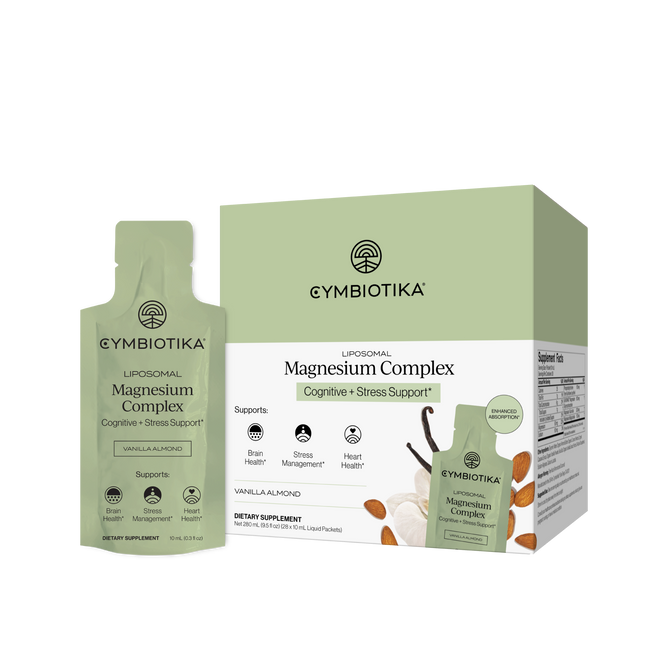 A packet and box of Cymbiotika Liposomal Magnesium Complex Packets - Cognitive + Stress Support in vanilla almond flavor, with icons and text highlighting stress, brain, and heart health benefits, plus almonds near the box for enhanced magnesium absorption.