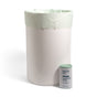 A white trash bin lined with Grove Co. Compostable Food Scrap Bags - 4 Gallon sits next to a matching container, perfect for use in kitchen compost pails or small bins.