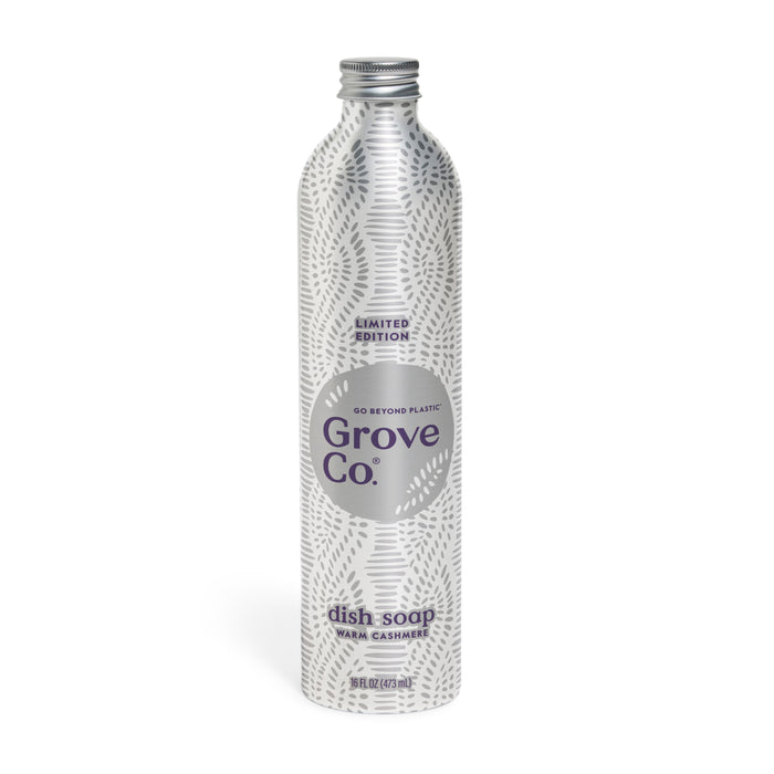 The Grove Co. Dish Soap Refill - Winter Collection comes in a silver aluminum bottle labeled “Limited Edition” and “Warm Cashmere,” with a patterned design, screw cap, “Go Beyond Plastic” text, and holds 16 oz (473 ml).