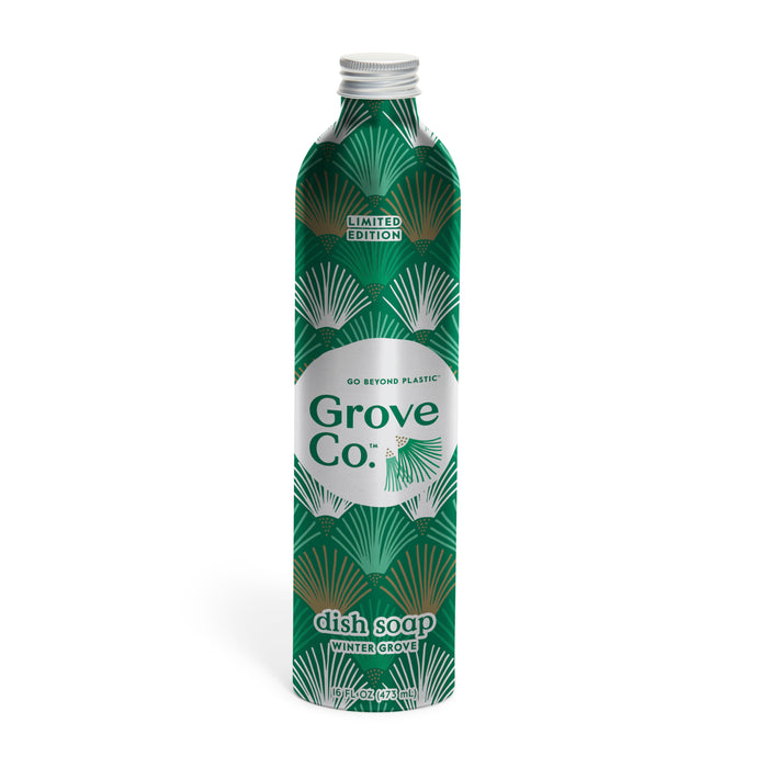 A limited edition Grove Co. Dish Soap Refill from the Winter Collection, featuring a green bottle with a decorative leaf pattern and white cap, labeled "Winter Grove" and promoting "Go Beyond Plastic.
