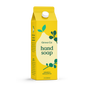 A yellow carton labeled Grove Collaborative features Grove Co. Hand Soap – Hydrates & Moisturizes With Every Wash, scented with lemon and eucalyptus. The milk carton-style package with green leaves and white text is a recyclable soap refill.