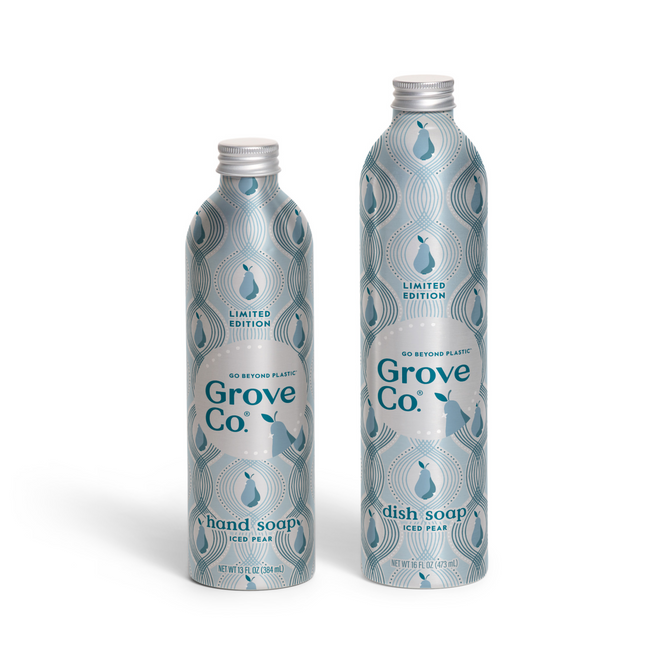 Two limited edition silver and light blue bottles of Grove Co. Scents & Suds - Winter Collection, labeled “hand soap” and “dish soap,” both in Iced Pear scent.