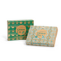 Two boxes of Grove Co. Laundry Detergent Sheets Set - Winter Collection: one upright with a green leaf pattern and the other tilted, featuring a blue and beige geometric design in eco-friendly packaging.