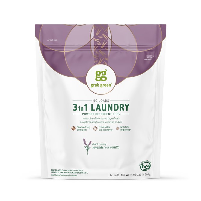 A white and purple grab green 3 in 1 Laundry Detergent Pods bag, Lavender with Vanilla scent, for 60 loads. The packaging features lavender artwork and highlights its natural ingredients.