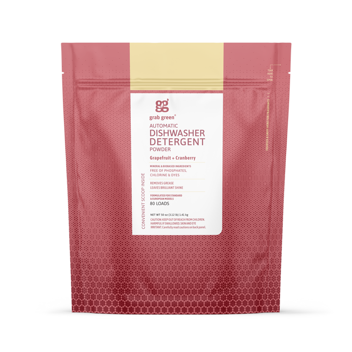 A stand-up pouch of grab green Automatic Dishwashing Detergent Powder - Grapefruit with Cranberry (Coming Soon!) delivers spot-free dishes and tough grease removal with eco-friendly ingredients and features a pink-red gradient design.