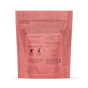 A pink grab green Stoneworks Laundry Detergent Pods - Rose Petal bag is shown from the back on a white background, displaying detailed use instructions—clear guidance to clean clothes and neutralize odors.