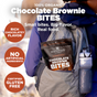 A person outdoors with a backpack pocket holding Navitas Organics Superfood + Chocolate Brownie BITES. Text highlights organic cacao's rich chocolatey flavor, gluten-free, no artificial ingredients, and 