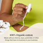 A hand holds a Cora Applicator Free Tampon made from 100% organic cotton, with a cotton plant nearby. Text on the image reads: Made without chlorine, dyes, pesticides, or anything else that doesn’t belong in your body.