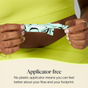 A person in a yellow outfit holds a Cora Applicator Free Tampon – 100% Organic Cotton, shown in green packaging. Text below reads: "Applicator-free. No plastic applicator means you can feel better about your flow and your footprint, while choosing Cora's organic cotton tampons that are gentle on you and the planet.