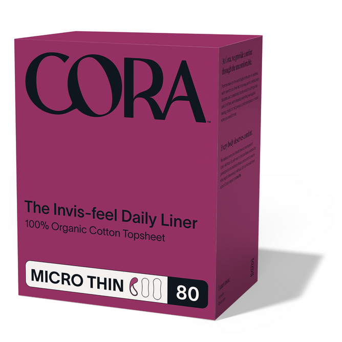 A purple box featuring the Cora logo prominently at the top displays Cora Invisi-feel Daily Liner, Micro Thin, with text highlighting “100% Organic Cotton Topsheet,” “MICRO THIN,” and “80.” The packaging emphasizes these hypoallergenic liners designed for comfortable daily freshness.