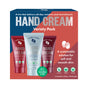 Hand in Hand Gift Set: Mini Hand Creams features three scents—Peppermint Spice, Fresh Snow, and Mulled Berry—in festive, sustainable teal, red, and white packaging. Ideal for gifting or personal use this holiday season.