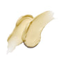 A close-up of two creamy, beige smears of Ursa Majors Golden Hour Body Butter on a white background, formulated to restore dry skin and support a healthy skin barrier.