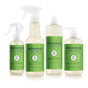 Four Mrs. Meyer’s Endless Summer Cleaning Set products with green labels—dish soap, multi-surface cleaner, hand soap, and room freshener—stand side by side in the limited edition Fresh Cut Grass scent.
