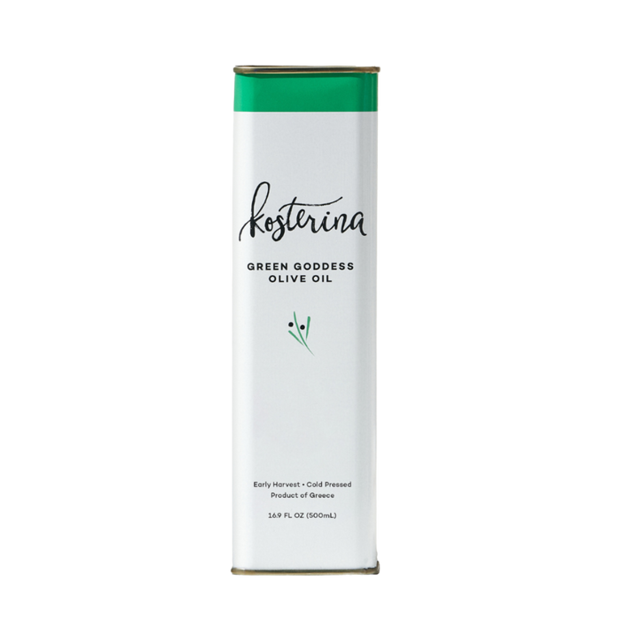 A rectangular tin of Kosterina Green Goddess Olive Oil features a white and green design with elegant script and simple graphics. The tin has a 16.9 fl oz (500 mL) capacity and is made in Greece.