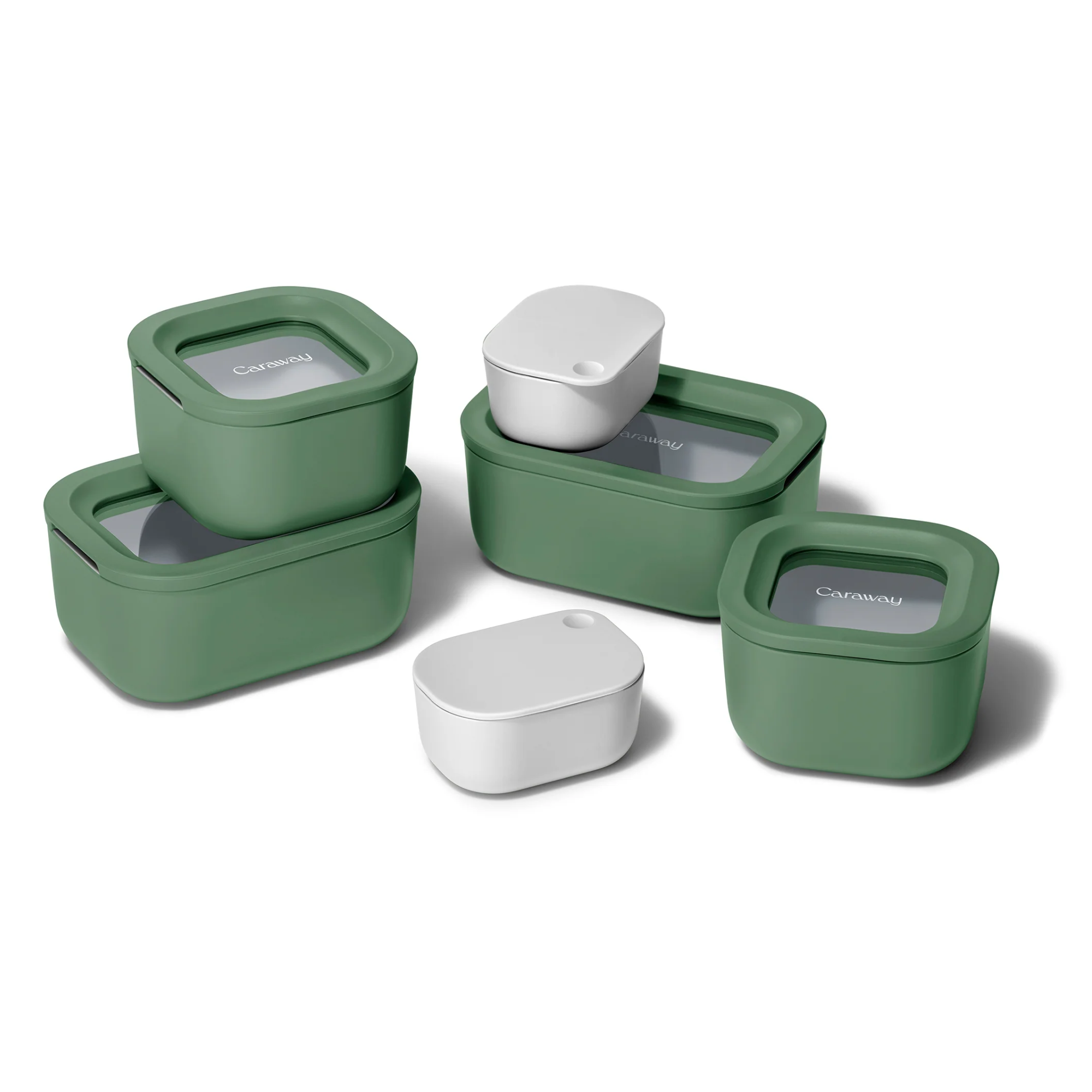 A set of five green and white food storage containers with clear lids, arranged on a white background. Four containers are green with transparent lids, and one is white with a matching lid.