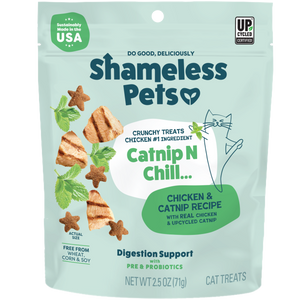 A bag of Shameless Pets Catnip N Chill Crunchy Cat Treats, featuring playful cat and chicken images. The packaging highlights real chicken, upcycled ingredients, and digestion support with prebiotics and probiotics.