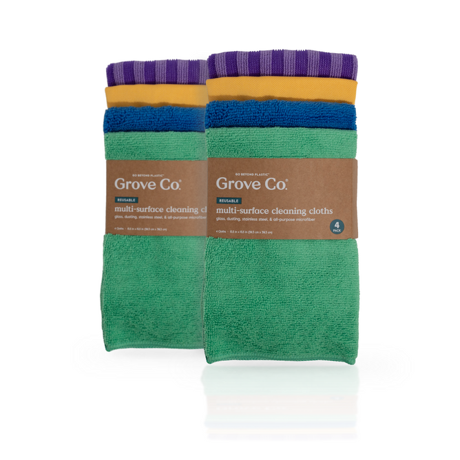 Buy One, Get One Free – Two sets of Grove Co. Assorted Cleaning Cloths, each featuring four reusable cloths in vibrant green, blue, yellow, and purple hues, neatly bundled with a brown paper label around the center.