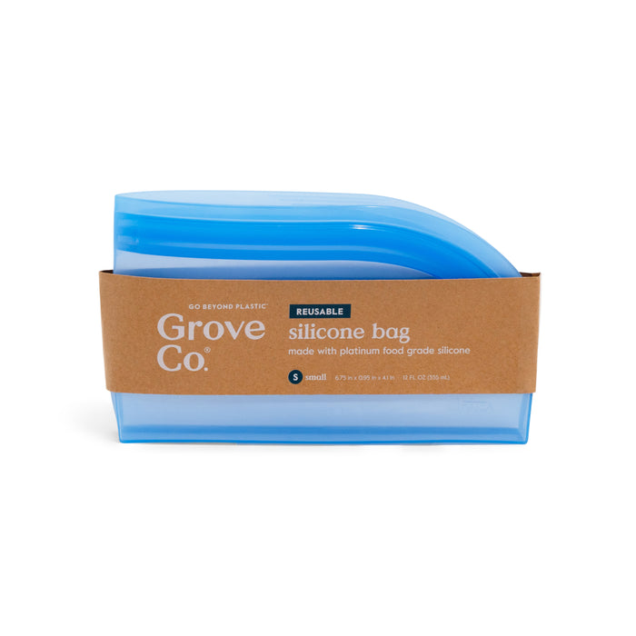 The Grove Co. Reusable Silicone Bag is a blue, leak-proof, upright bag made with platinum food grade silicone for eco-friendly storage. It features a brown paper label and is pictured against a white background.
