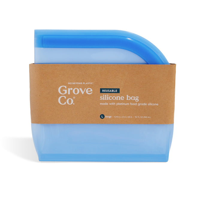 The Grove Co. Reusable Silicone Bag, shown upright with a brown kraft paper label, is made from platinum food grade silicone for sustainable storage.