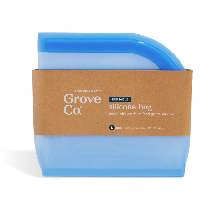 The Grove Co. Reusable Silicone Bag, shown upright with a brown kraft paper label, is made from platinum food grade silicone for sustainable storage.