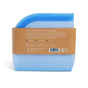 The Grove Co. Reusable Silicone Bag is a partially translucent blue bag with a brown cardboard label, featuring sustainable storage benefits like leak-proof design, stand-up base, and heat resistance.