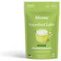 A green pouch of blume Organic Matcha Coconut Latte Powder, an antioxidant-rich superfood with “Zero Sugar,” “Jitter-Free Caffeine,” and 25 servings, shown alongside a glass mug of foamy green latte.