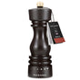 The Cole & Mason Wood Pepper Grinder features a dark wood body with a gold-colored top, an adjustment dial for grind select, and a carbon steel grinding mechanism. A product tag displays the brand and product information.