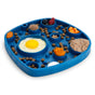 The West Paw Seaflex Bubbles Feast Mat is an all-in-one slow feeder and lick mat, shown here filled with a raw egg, blueberries, raspberries, orange cubes, ground meat, kibble, and pureed veggies for pet enrichment.