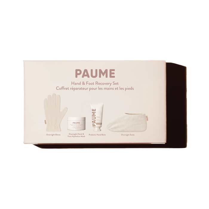 A self-care gift box featuring the PAUME Hand and Foot Recovery Gift Set with overnight gloves, hand balm, hydration mask jar, and overnight socks shown on a plain white background.