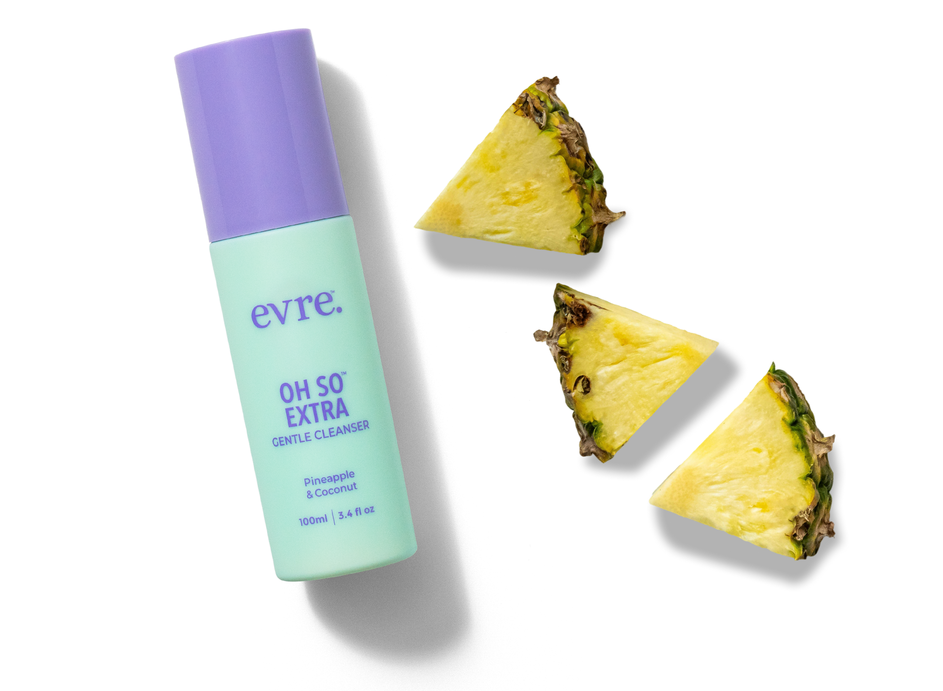 Evre skincare product with pineapple slices on a white background