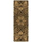 The Harmony Aura Cork Yoga Mat by Yoloha Yoga is a cushioned yoga mat featuring an ornate gold mandala and floral pattern on a black background, showcasing intricate, symmetrical designs and detailed eco-friendly plant foam construction.