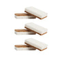 Three pairs of layered sponge cakes, each with white and brown layers, are arranged vertically against a white background, resembling Grove Co. Heavy-Duty Agave Scrubber Sponges (3-Pack), made from natural agave fibers for plant-based cleaning.