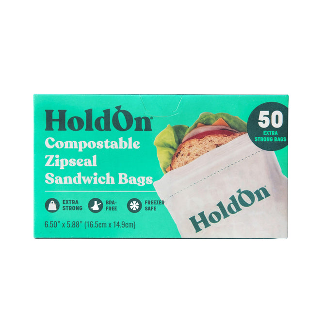 A box of HoldOn Bags Compostable Sandwich Bags - Freezer Safe, featuring a sandwich image, contains 50 extra strong, BPA-free, compostable bags (6.5 x 5.88 inches), perfect for food storage and freezing.