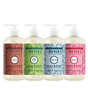 Four bottles from the Mrs. Meyer’s Holiday Hand Soap Collection in gingerbread, pine, snowdrop, and peppermint scents.