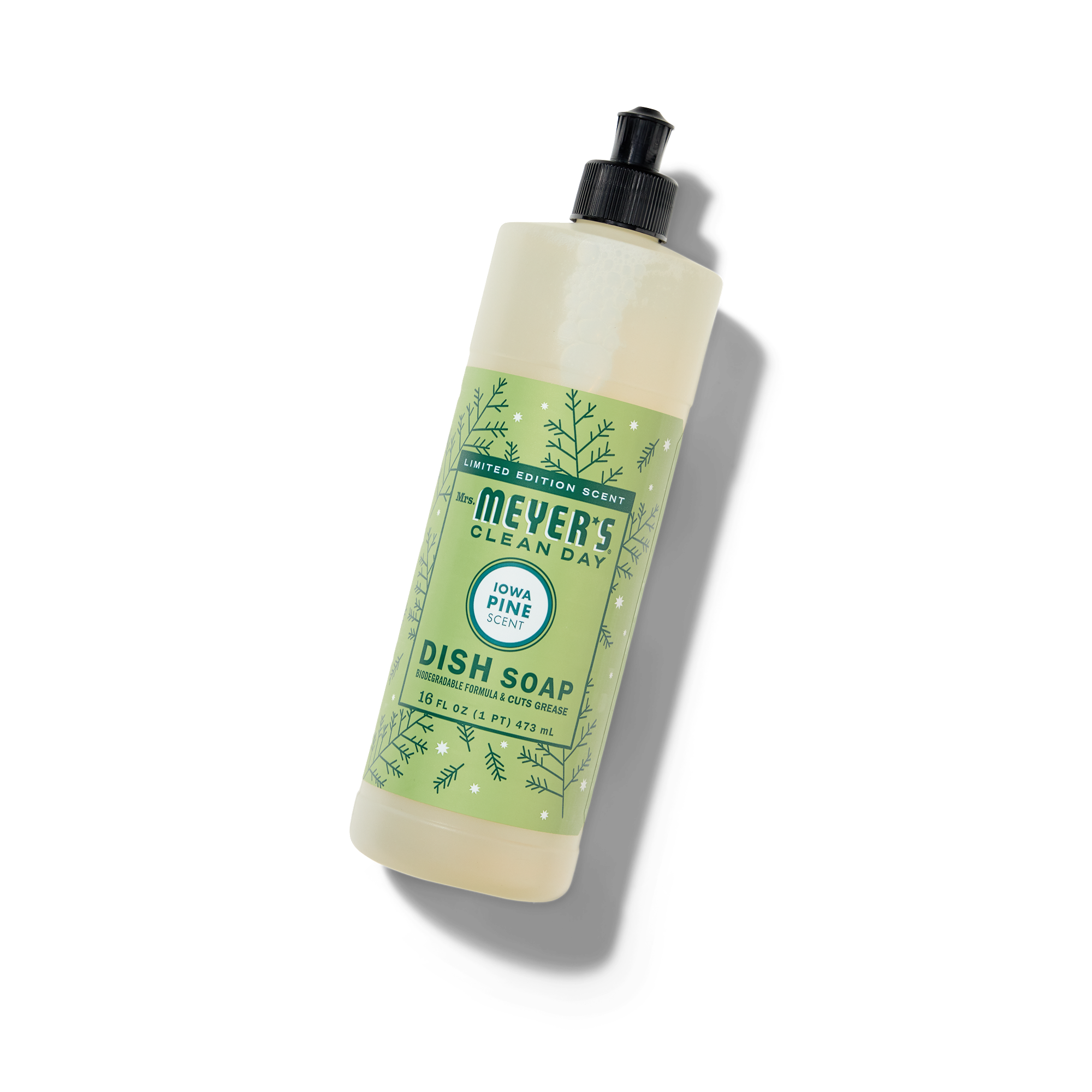 A bottle of Mrs. Meyers Clean Day Dish Soap in Iowa Pine scent with a green label featuring pine illustrations, a black flip-top cap, and a white background.