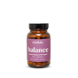 A brown glass bottle with a black lid, labeled "Rookie Wellness Balance Capsules - Hormone Balance + PMS Support." The purple label with white text highlights DIM and Chasteberry for estrogen detox. Contains 60 capsules.