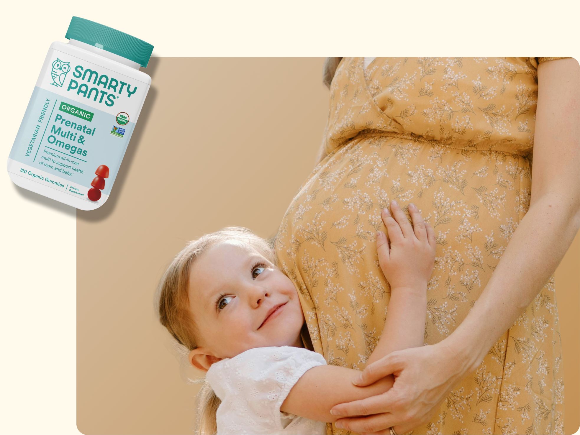 A young girl hugs a pregnant woman’s belly and smiles, while a bottle of SmartyPants Prenatal Multi & Omegas vitamins is shown in the corner. The background is a soft beige color.