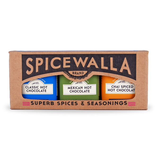 The Spicewalla Haute Chocolate Collection 3 Pack features Classic, Mexican, and Chai Spiced hot chocolates, crafted with Guittard cocoa and premium spices. The packaging highlights Spicewalla's Superb Spices & Seasonings.